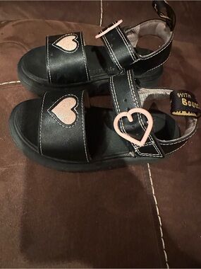 Dr. Martens Kids Black Sandals with Pink Heart Accents